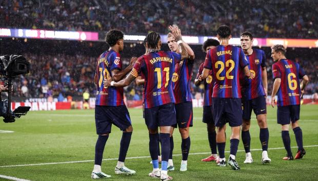 Los jugadores del FC Barcelona, en un partido en el Camp Nou