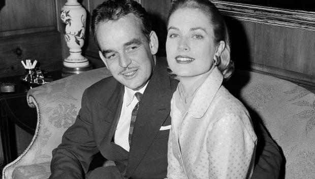 FILE - This Jan. 5, 1956 file photo shows American actres Grace kelly, right, with Prince Rainier III of Monaco in the home of Miss Kelly's parents in Philadelphia. Pennsylvania's James A. Michener Museum is hosting an exhibit that traces the Kelly's life from growing up in Philadelphia to starring in films and marrying Prince Rainier III. It opens at the museum on Oct. 31 and runs through Jan. 26, 2014. (AP Photo, file)