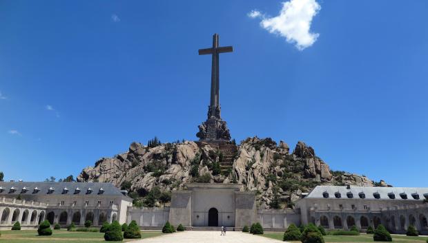 A 155 metres high and 44 metres wide concrete cross stands on the top of the Risco de la Nava behind the Benedictine abbey in the Valle de los Caidos (Valley of the Fallen). 
05 July 2018, Spain, El Escorial: