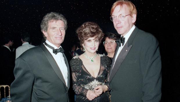 File photo - The 44th Edition of the Cannes Film Festival in 1991 - Jack Lang, Gina Lollobrigida and Donald Sutherland during the opening night of the Cannes Film Festival. -- Legendary Italian actress Gina Lollobrigida has died at the age of 95, the Italian Minister of Culture announced on Twitter on Monday January 16. On September 12, she fractured her femur when she fell at her home. Photo by APS-Medias/ABACAPRESS.COM
