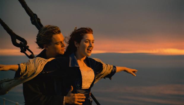 TITANIC, from left: Leonardo DiCaprio, Kate Winslet, 1997. TM & Copyright ©20th Century Fox Film Corp. All rights reserved./Courtesy Everett Collection 
1990s movies 1997 movies 4MMR12 Arms outstretched Couple Dicaprio,leonardo Exterior Movies PvVAM Red hair Ship Ste-DOM Winslet,kate