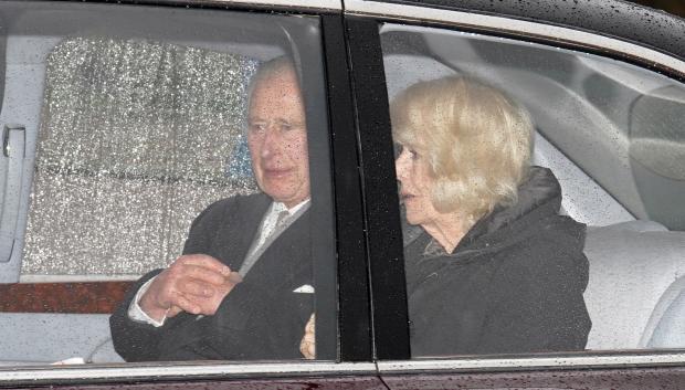 King Charles III and Queen Camilla arriving back at Clarence House in London