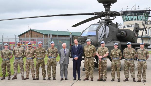 King Charles III and Prince William of Wales visiting the Army Air Corps in Stockbridge. Picture date: Monday May 13, 2024.