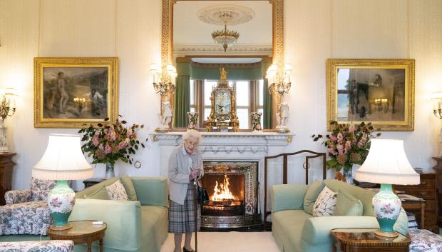 Queen Elizabeth II waits in the Drawing Room before receiving LizTruss for an audience at Balmoral, Scotland, where she invited the newly elected leader of the Conservative party to become Prime Minister and form a new government. Picture date: Tuesday September 6, 2022.