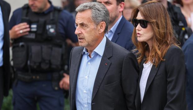 Carla Bruni and Nicolas Sarkozy during burial of Francoise Hardy in Paris