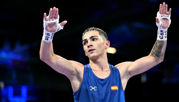 Spain's Rafael Lozano Serrano celebrates after winning against Australia's Yusuf Chothia in the men's 51kg preliminaries round of 16 boxing match during the Paris 2024 Olympic Games at the North Paris Arena, in Villepinte on July 30, 2024. (Photo by MOHD RASFAN / AFP)