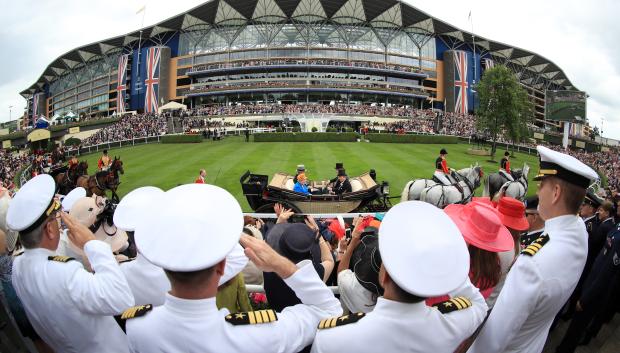 Sailors salute as Queen Elizabeth II arrives, during day three of Royal Ascot 2016,