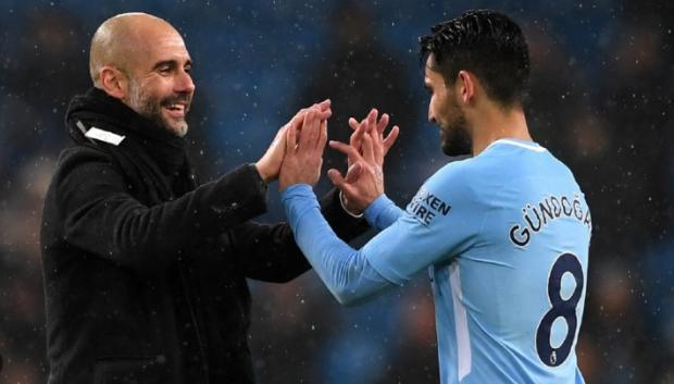 Gundogan y Guardiola en una imagen de archivo en el Manchester City