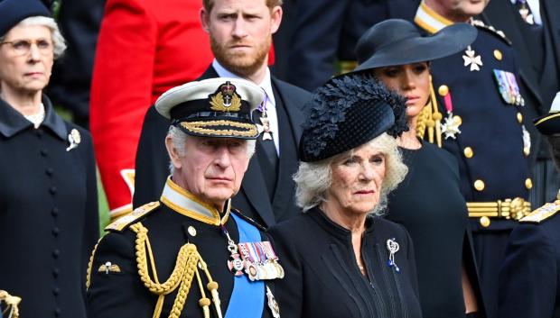 Britain´s King Charles III, Camilla, the Queen Consort, Meghan Markle , Duchess of Sussex, and Prince Harry during the carriage procession for Queen Elizabeth II's state funeral from London to Windsor on 19 September 2022