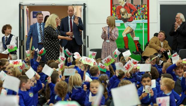 The Prince of Wales during a visit to Swiss Valley Community Primary School in Llanelli, Carmarthenshire, to meet pupils who took part in the 2024 Urdd Eisteddfod. Picture date: Tuesday September 10, 2024. *** Local Caption *** .