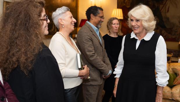 Queen Camilla talks with Charlotte Wood during a reception for the Booker Prize Foundation at Clarence House, London. Picture date: Tuesday November 12, 2024. *** Local Caption *** .