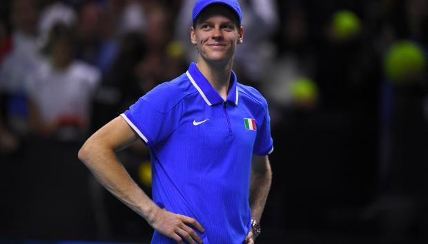 Jannik Sinner of Team Italy smiles after beating Alex de Minaur of Team Australia during their semi-final singles match between Italy and Australia at the Davis Cup Finals at the Palacio de Deportes Jose Maria Martin Carpena arena in Malaga, southern Spain, on November 23, 2024. (Photo by JORGE GUERRERO / AFP)