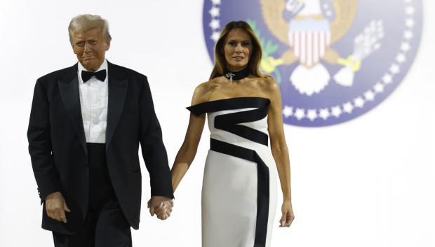 WASHINGTON, DC - JANUARY 20: President Donald Trump walks onstage with wife Melania at the Commander-in-Chief Ball on January 20, 2025 in Washington, DC. President Trump attends some of the inaugural balls after taking the oath as the 47th president. Credit: Anna Moneymaker / Pool via CNP