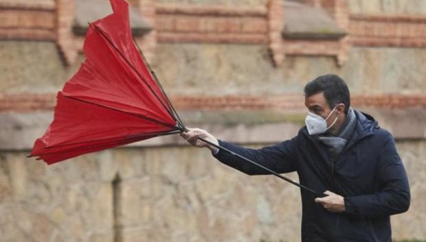 Pedro Sánchez y el paraguas rojo