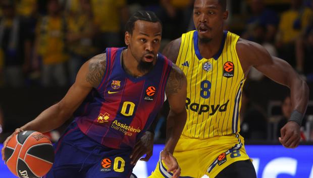 Kevin Punter ataca ante Lonnie Walker IV en el partido de Euroliga