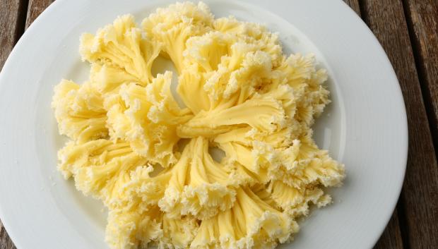 Queso Tête de Moine, cuyda forma recuerda a