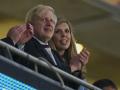 British Prime Minister Boris Johnson and Carrie Johson Bevan during Euro 2020 soccer championship semifinal in London, Wednesday, July 7, 2021.