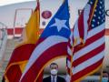 Felipe VI, frente a las banderas española, puertorriqueña y estadounidense