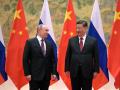 El presidente chino, Xi Jinping, junto al ruso, Vladimir Putin