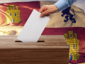 Simulación de ciudadano depositando su voto en las urnas, con la bandera de la Comunidad de Castilla y León por detrás