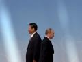 El presidente ruso, Vladimir Putin junto al chino, Xi Jinping