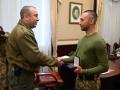 Roman Hrybov recibe su medalla