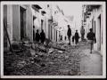 Calle Muñiz con escombros de las casas destruidas por el bombardeo republicano