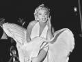 Marilyn Monroe poses over the updraft of New York subway grating while in character for the filming of  " The Seven Year Itch " / " La tentacion vive arriba " ; in Manhattan on September 15, 1954.