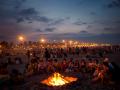 Men and women sit around a fire as they celebrate the San Juan night at a beach in Valencia, Spain, Thursday, June 23, 2011. The San Juan night coincides with the shortest night of the year, and ushers in the start of summer in many cities and towns in Spain