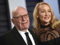 Rupert Murdoch, left, and model Jerry Hall arrive at the Vanity Fair Oscar Party on Sunday, Feb. 24, 2019, in Beverly Hills, Calif.