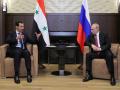 El presidente ruso, Vladimir Putin (d), y el presidente de Siria, Bashar al-Assad (d), en reunión en Sochi (Rusia) (2018)