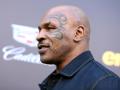 Boxeador Mike Tyson mostrando su extravagante tatuaje facial