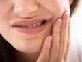 Close-up Of A Woman Having Tooth Problem.Woman,Having,tooth, decay, sore, dental, pain, ache, man, teeth,tooth, decay, sore, dental, pain, ache, man, teeth,tooth, decay, sore, dental, pain, ache, man, teeth, mouth, toothache, dermatology, home, medical, sick, patient, panoramic, unhappy, banner, background, health, problem, men, healthcare, oral, uncomfortable, hurt, worried, young, painful, male, touching, aching, lifestyle, adult, grief, closeup, illness, one, copy, space, indoors, caucasian, sensitivity