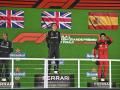 Russell junto a Hamilton y Sainz en el podio