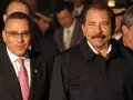 Expresidente salvadoreño Mauricio Funes (Iz.) y el dictador nicaragüense Daniel Ortega