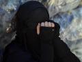 Una mujer con niqab en el campamento de familiares de milicianos de Estado Islámico en Al Hol, en Siria