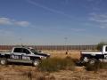 vehículos policiales en Rio Grande, cerca de Ciudad Juarez, controlan el paso de inmigración ilegal a Estados Unidos