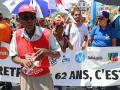 Protesters attend a demonstration on the fourth day of nationwide rallies organised since the start of the year, against a deeply unpopular pensions overhaul, in Saint-Denis de la Reunion on the French Indian island of La Reunion on February 11, 2023. (Photo by Richard BOUHET / AFP)