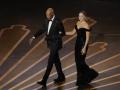 HOLLYWOOD, CALIFORNIA - MARCH 12: (L-R) Morgan Freeman and Margot Robbie walk onstage during the 95th Annual Academy Awards at Dolby Theatre on March 12, 2023 in Hollywood, California.   Kevin Winter/Getty Images/AFP (Photo by KEVIN WINTER / GETTY IMAGES NORTH AMERICA / Getty Images via AFP)