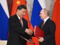 El presidente ruso Vladimir Putin y el presidente chino Xi Jinping