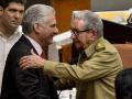 (FILES) In this file photo taken on December 21, 2019, Cuban First Secretary of the Communist Party Raul Castro (R), greets Cuban President Miguel Diaz Canel during the closing of the Fourth Regular Session of the National Assembly of People's Power in its 9th Legislature at the Havana Convention Center. - Cuba's President Miguel Díaz-Canel is expected to be reelected by the parliament for a second and final five-year term on April 19, 2023, presidential elections, amid the communist island's worst economic crisis in three decades. (Photo by YAMIL LAGE / AFP)