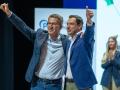 Alberto Núñez Feijóo y Juanma Moreno, en el mitin del PP en Sevilla