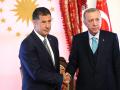 El presidente turco Recep Tayyip Erdogan y el tercer candidato presidencial Sinan Ogan