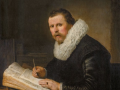 'Retrato de un hombre en un escritorio' de Rembrandt
