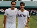 Roger Federer y Carlos Alcaraz, en Wimbledon 2019