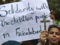 protest to condemn the attacks on churches in Pakistan, in Karachi on August 18, 2023. Homes and churches were burned and ransacked by a crowd of hundreds that tore through the streets in Jaranwala, on the outskirts of the industrial city of Faisalabad, on August 16. (Photo by Asif HASSAN / AFP)
