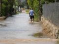 La calle inundada por las lluvias en Les Cases d'Alcanar, Tarragona