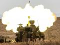 Un obús autopropulsado M109 de 155 mm del ejército israelí dispara rondas cerca de la frontera con Gaza