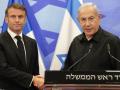 Israeli Prime Minister Benjamin Netanyahu (R) shakes hands with French President Emmanuel Macron (L) after their joint press conference in Jerusalem on October 24, 2023. Macron's visit comes more than two weeks after Hamas militants stormed into Israel from the Gaza Strip and killed at least 1,400 people, according to Israeli officials while Israel continues a relentless bombardment of the Gaza Strip and prepares for a ground offensive with more than 5,000 Palestinians, mainly civilians, killed so far across the Palestinian territory, according to the latest toll from the Hamas health ministry in Gaza. (Photo by Christophe Ena / POOL / AFP)