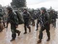 Soldados israelíes se preparan para ir a la Franja de Gaza